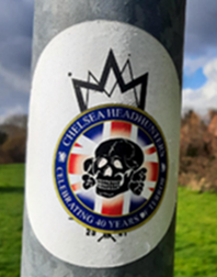Image showing example of an offensive extremism poster attached to a post